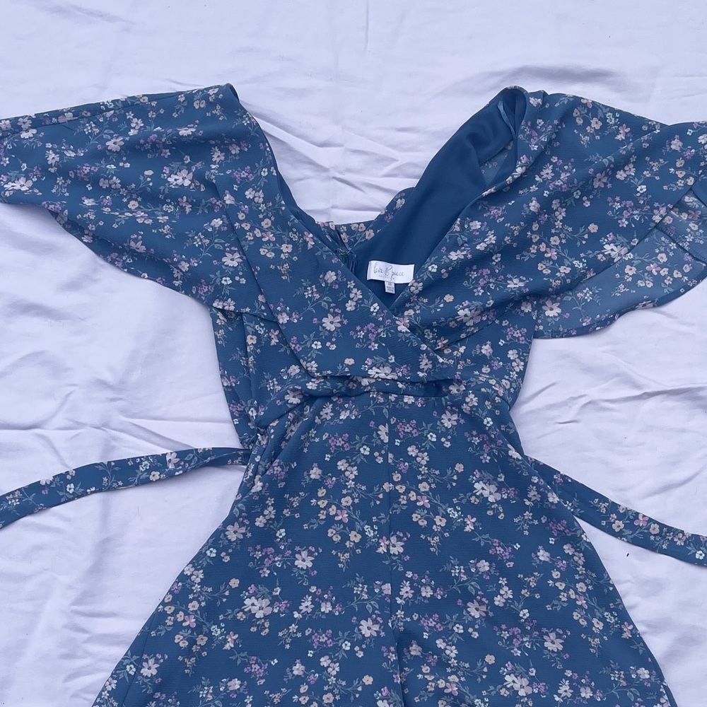 Francessca’s Blue Floral Romper